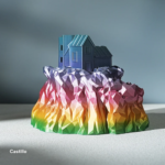Castillo sobre base rocosa multicolor impreso con filamento SUNLU PLA Arcoíris de Smartec Store, con transición de colores vibrantes